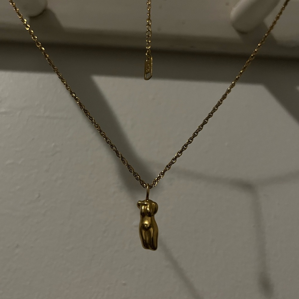 Woman’s body gold necklace